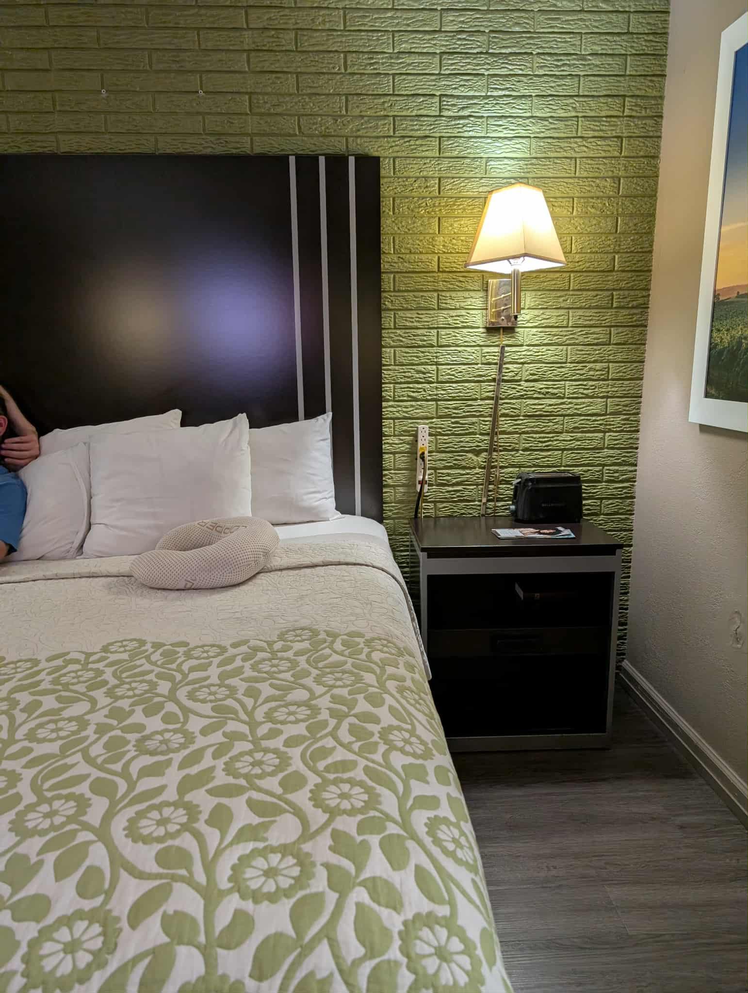 That is the glow of the TV on the head board if anyone was wandering I look this photo from an angle because my man was trying out the bed we both loved it!!!! very comfortable!!