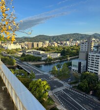 View from 14th floor outdoor seating area. The Hiroshima museum is just across the bridge and easily walkable.
