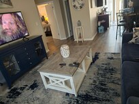 Living room with adjoining kitchen