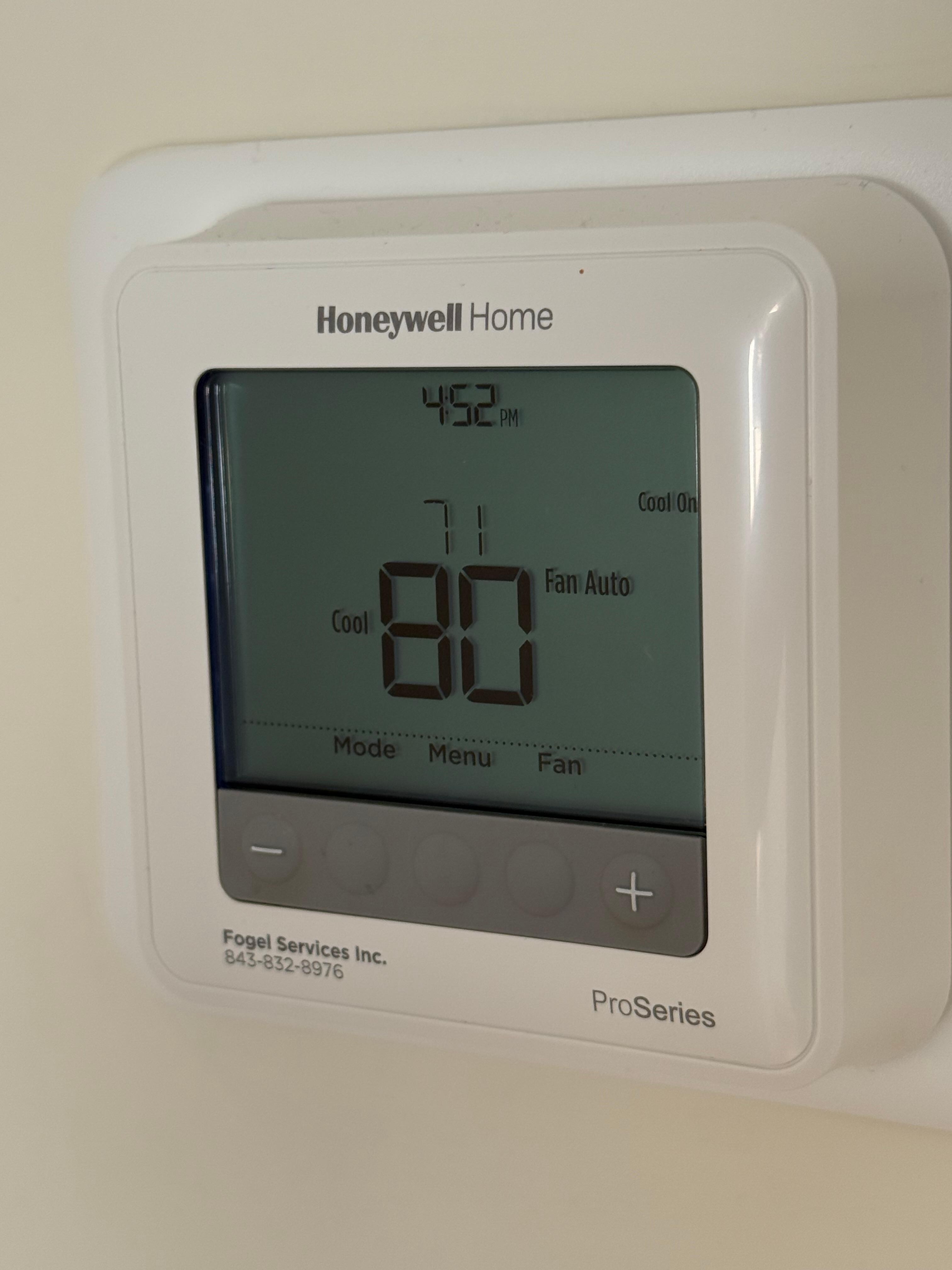 Thermostat set to 71 with inside temp at 80. 
