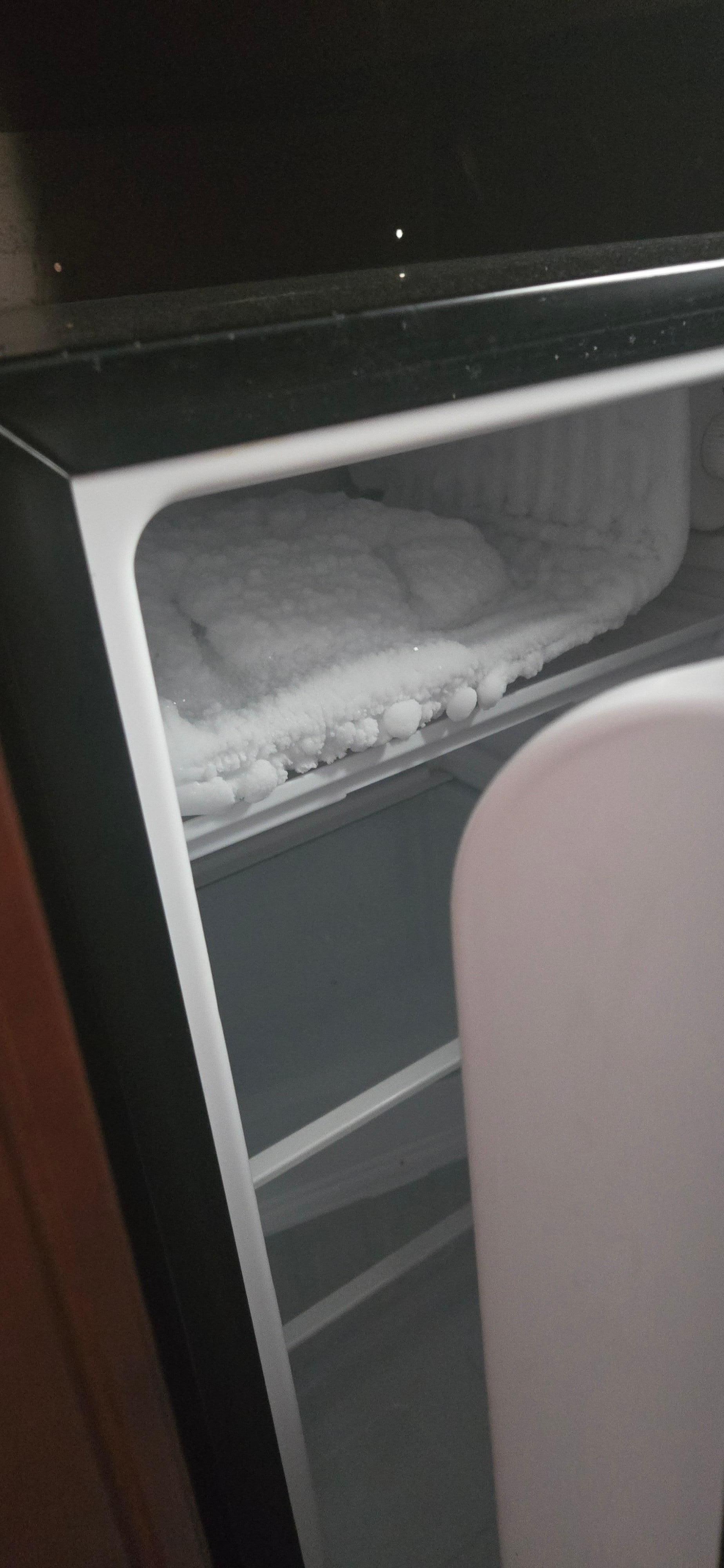 Refrigerator freezer over half iced up.  Couldn't use.