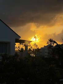Sun burning through the morning clouds over the ocean...it was amazing from the balcony of our unit.