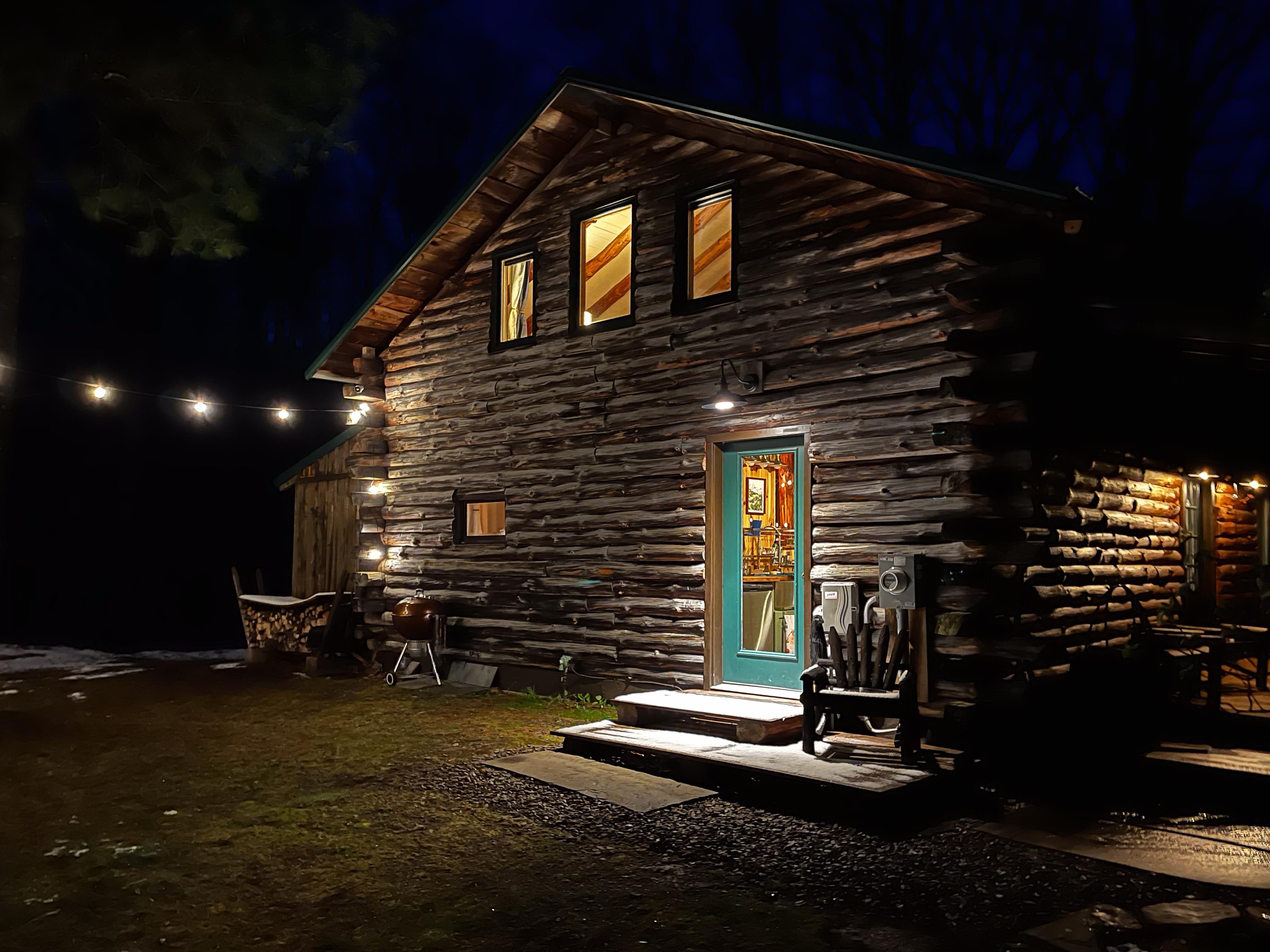 Side of the cabin at night