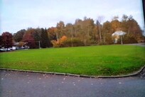 Well maintained grassy area next to the hotel.