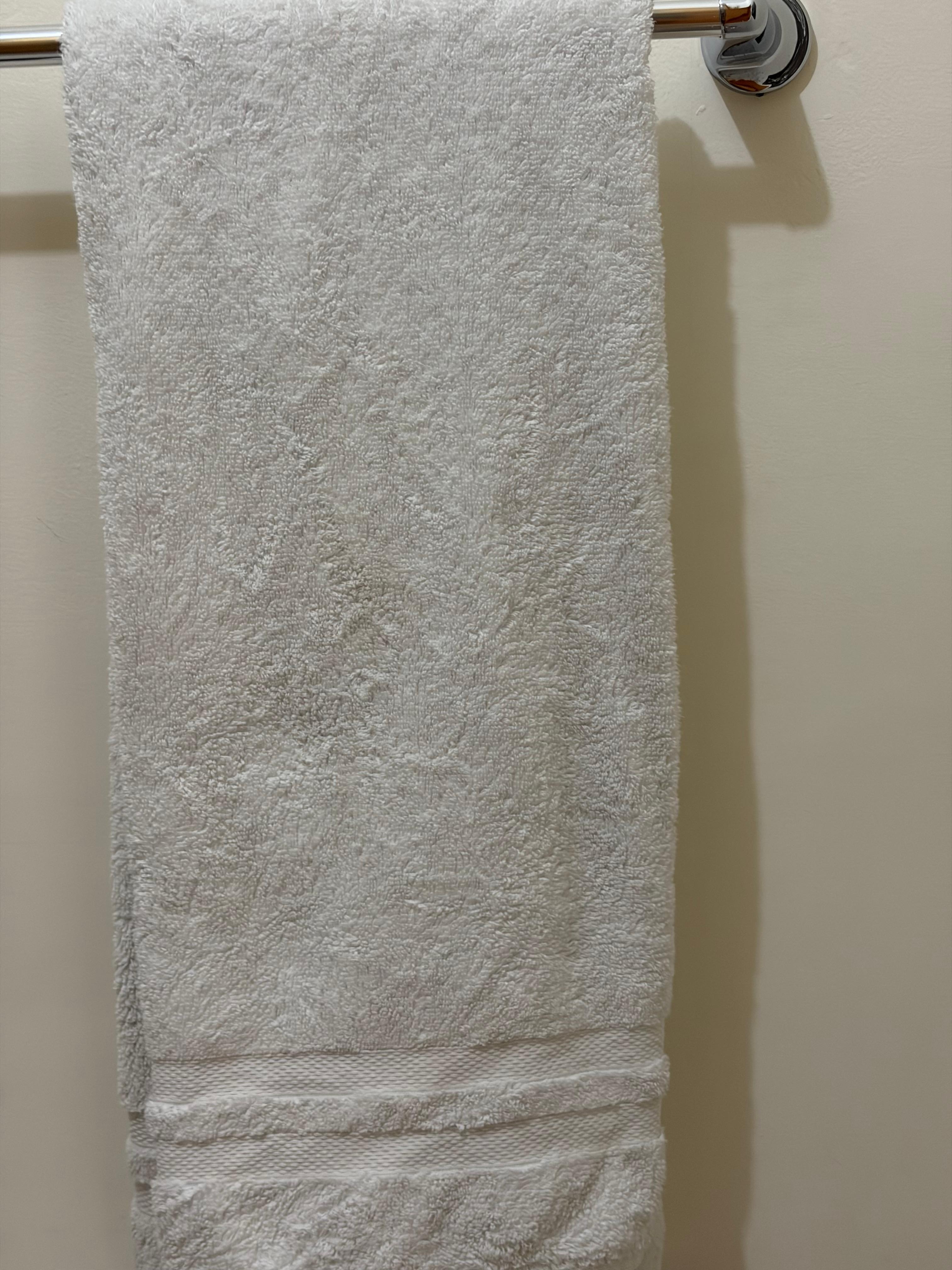 Bath towels were gray. Sheets, bath towels and dish towels were stained. The towels  used to be white but are now gray. The bath mats were very dirty and looked like they hadn’t been washed in months. I washed them.