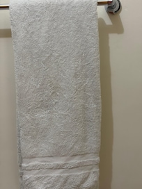 Bath towels were gray. Sheets, bath towels and dish towels were stained. The towels used to be white but are now gray. The bath mats were very dirty and looked like they hadn’t been washed in months. I washed them.