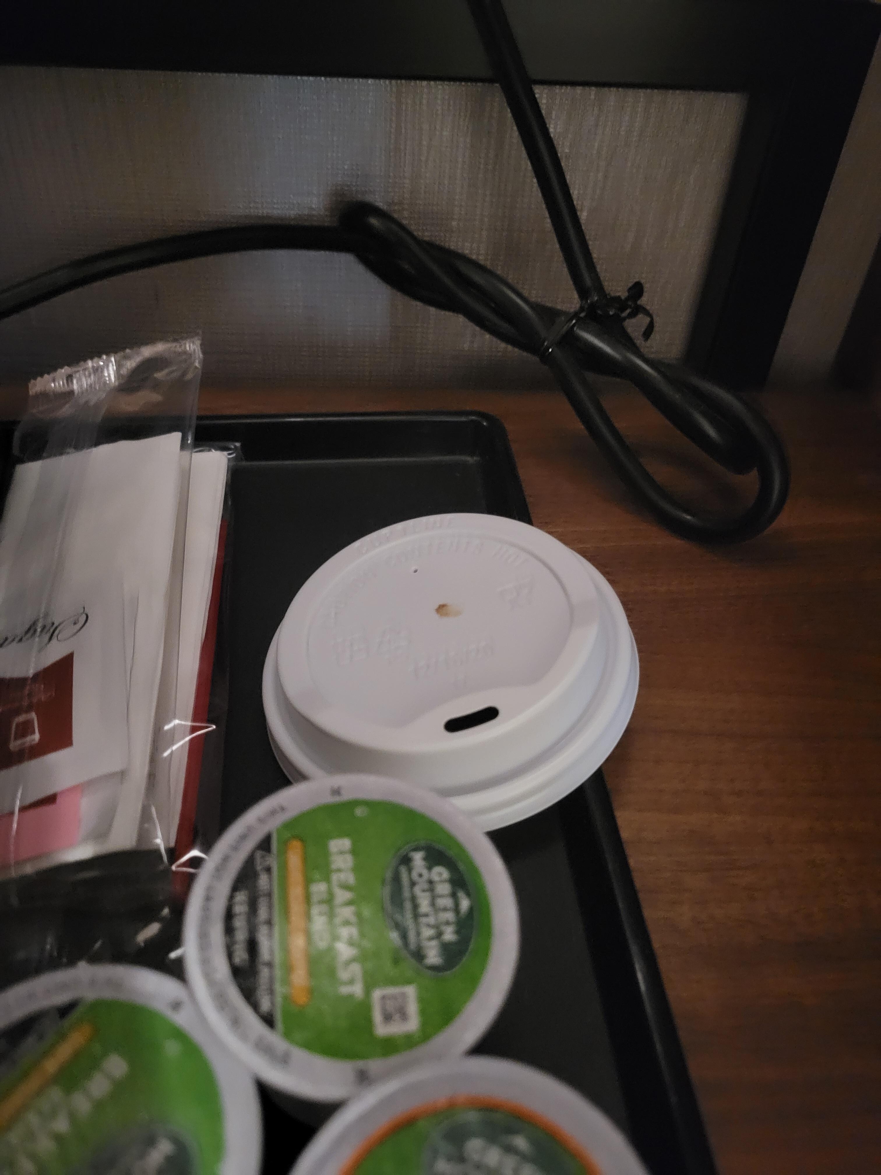 Dirty coffee cup top