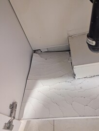 Bathroom sink drain leaks, clearly for a long time as the space under the sink is heavily water damaged