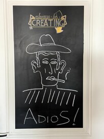 Chalkboard in room encourages fun. Chalk included!