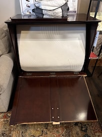 Without the broken parts laying against the bed, the front falls down. Can’t sit at the table.