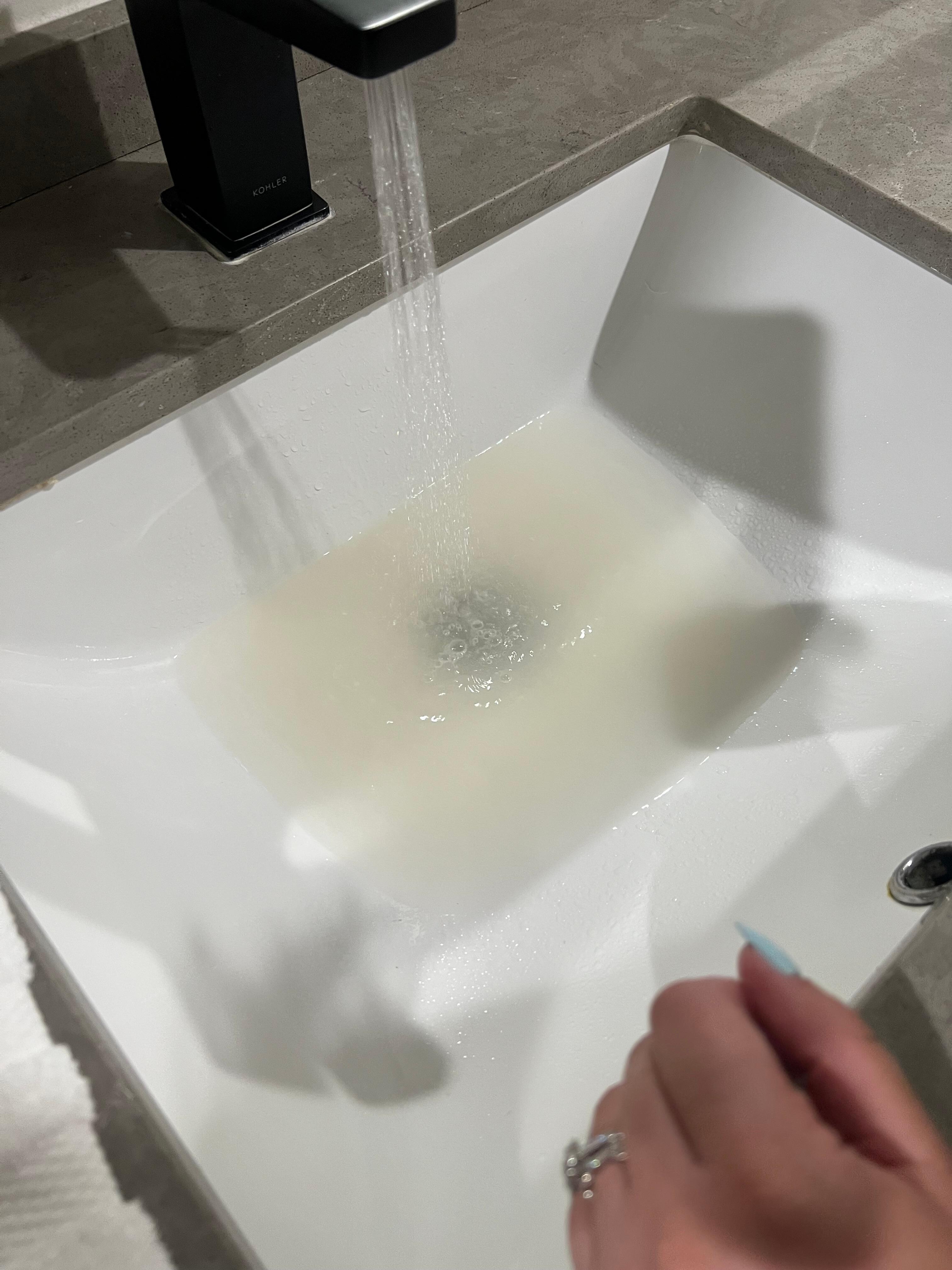 Sink water brown colored 