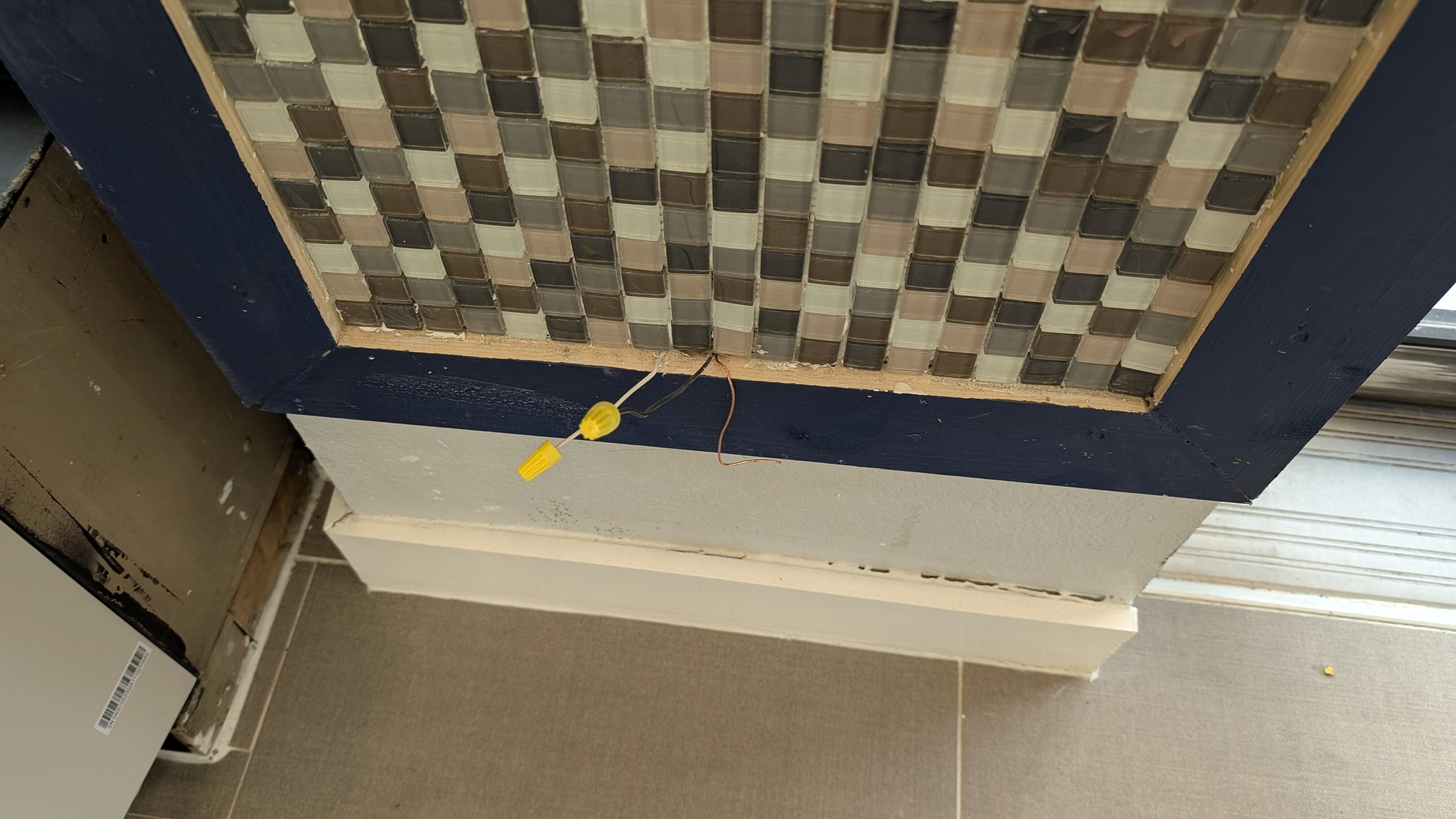 Main Lobby had multiple areas with exposed wires