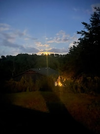 View from the backyard of the sun setting