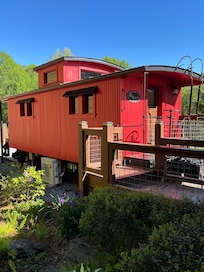 Caboose, offers unique comfortable charm.