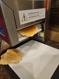 Pancake maker at continental breakfast