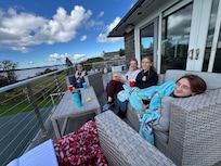 Comfy outdoor furniture to enjoy the breathtaking views.