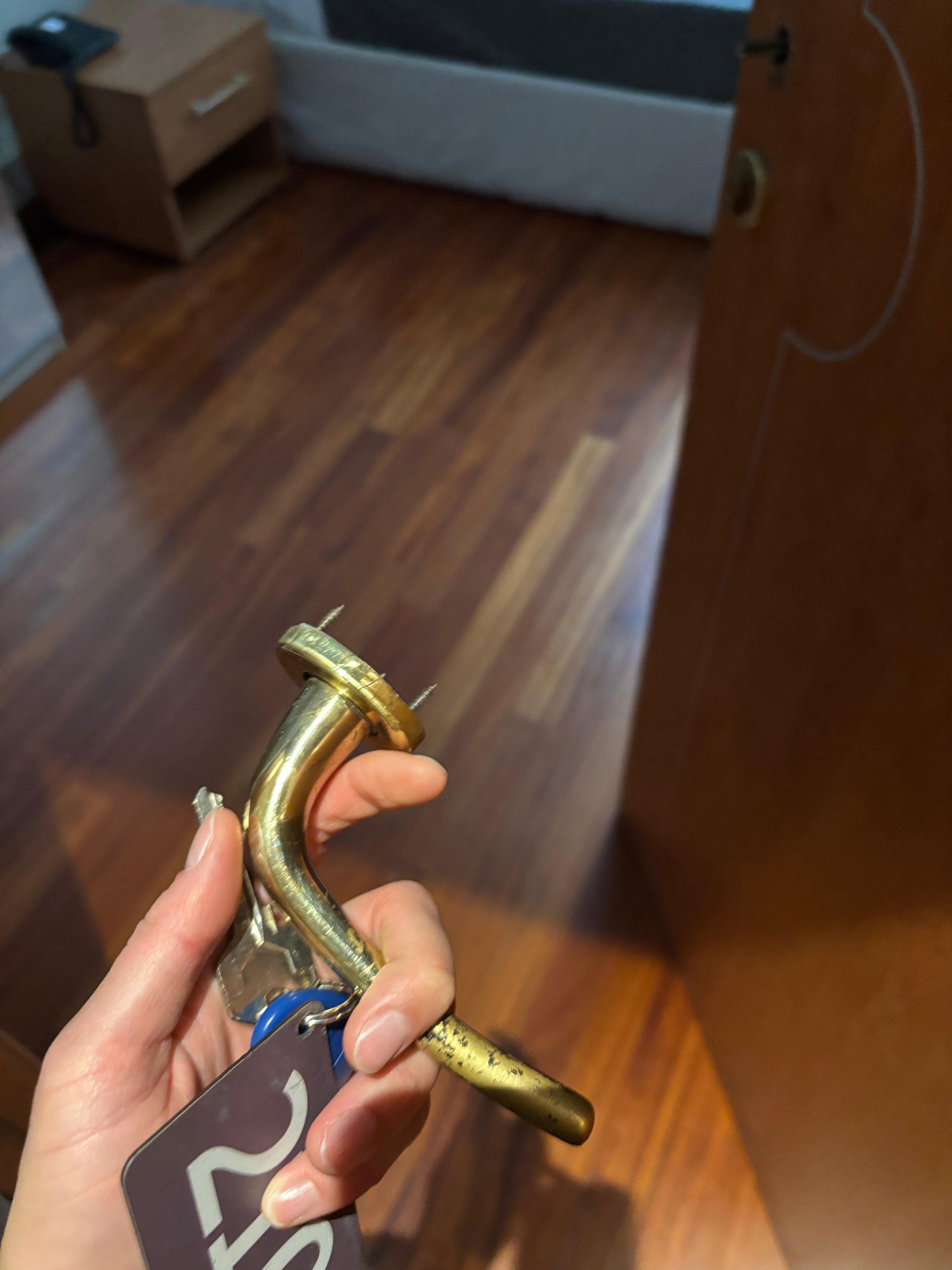 The door handle that was held on only by one screw. Room 210