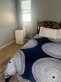 Noisy portable AC next to head of the bed