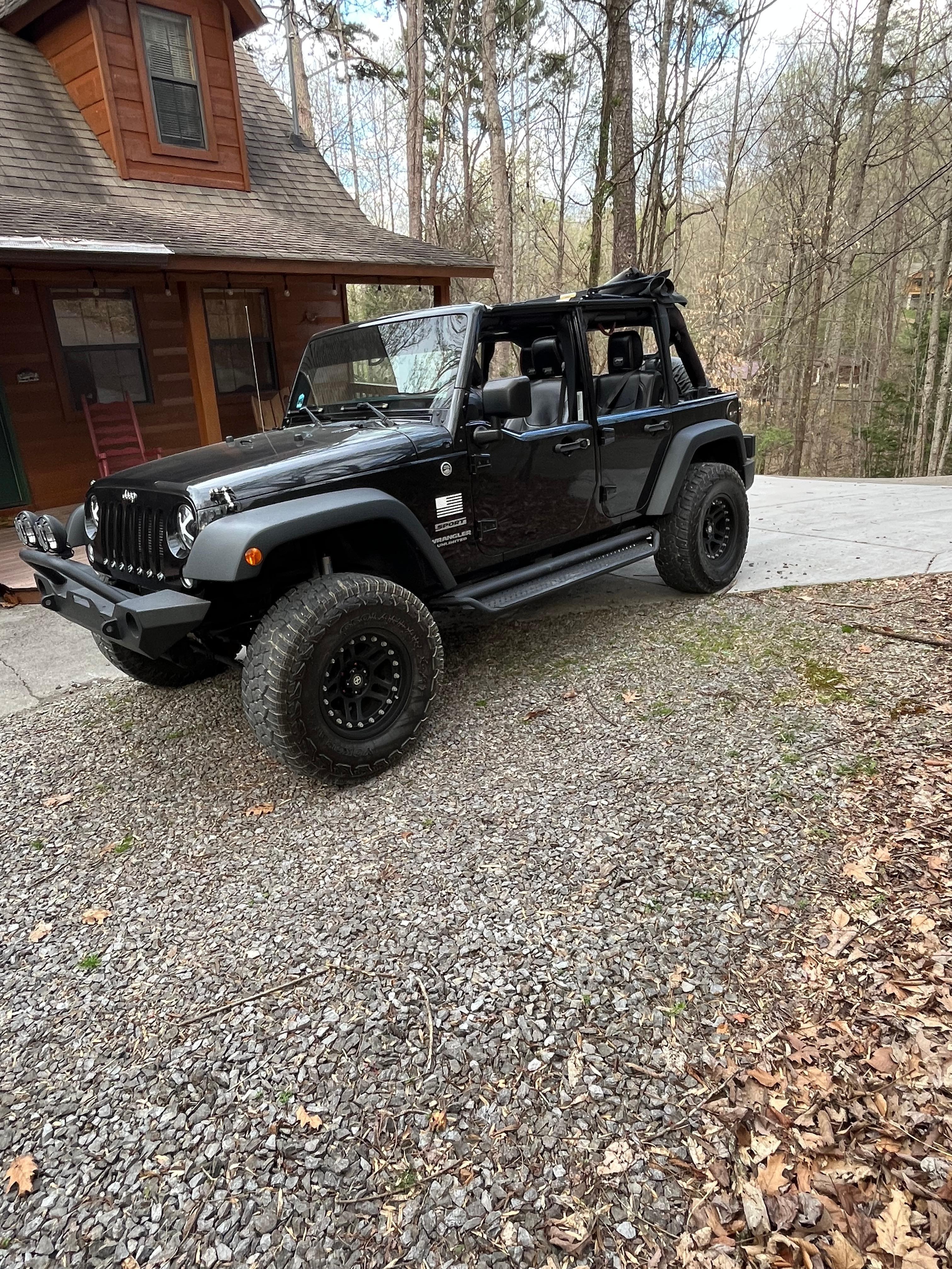 Short steep driveway but parking area is perfect with room easily for 3 vehicles..