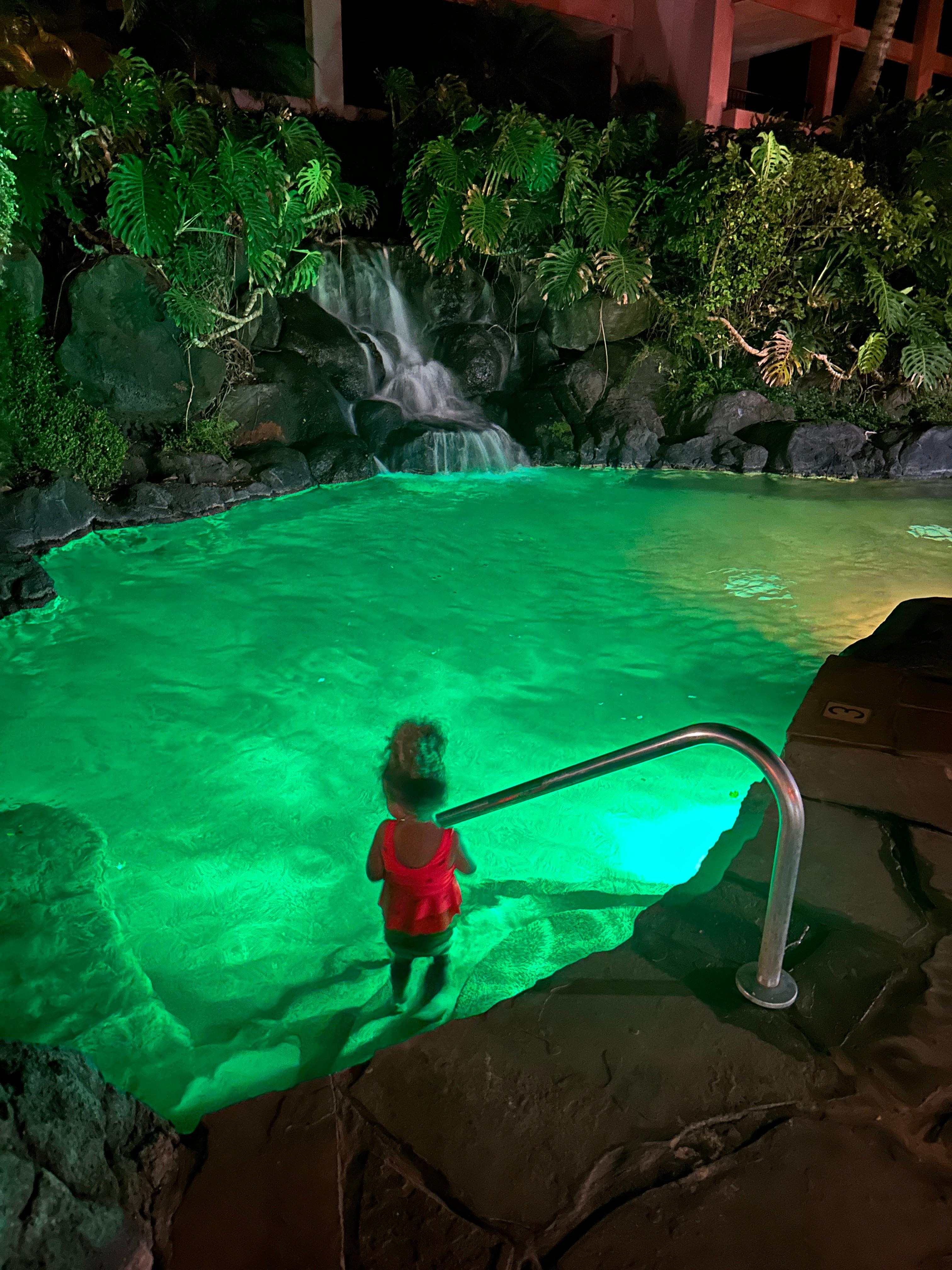 The pool at night with color changing lights