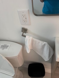 Hand towel rack barely attached to wall (we bought the hand towel)