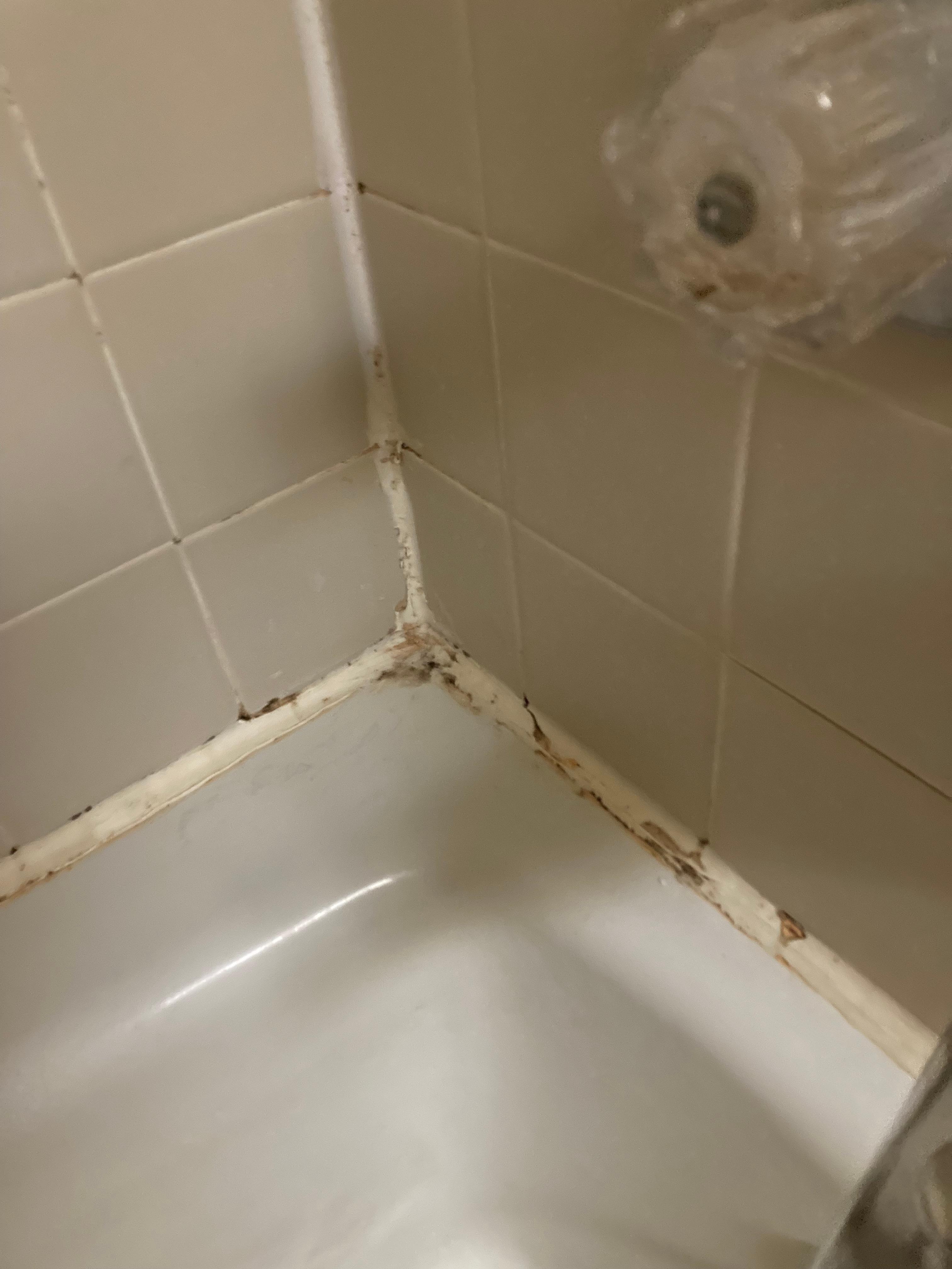 Caulk smeared around edge