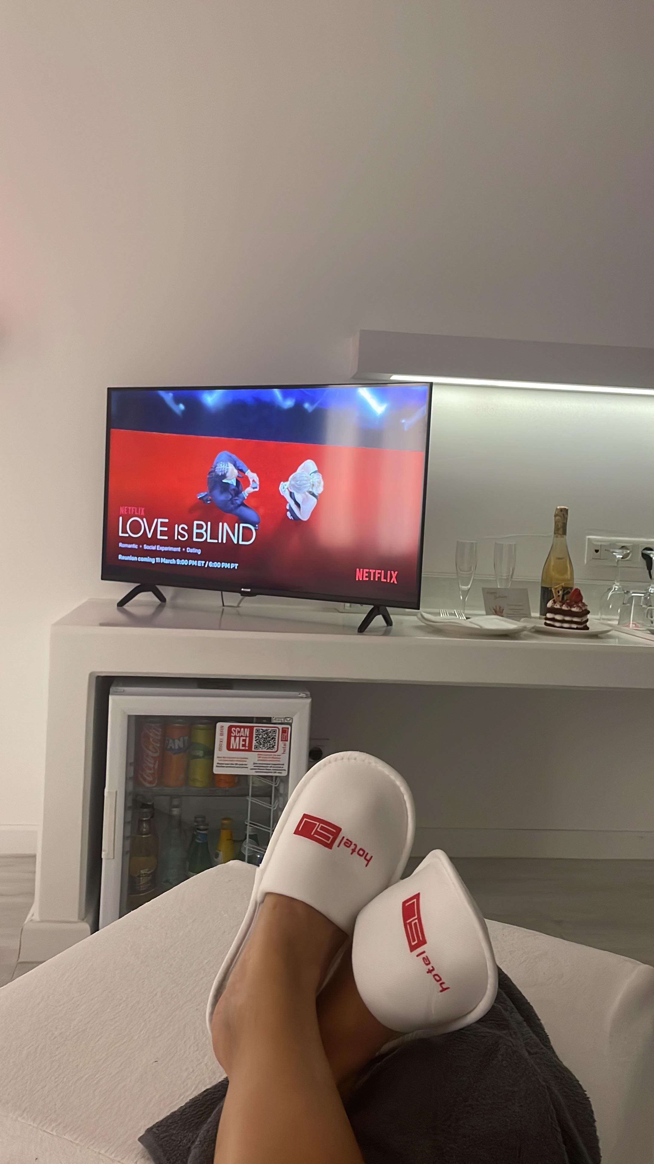 Netflix & chill. Complimentary slippers & gown 