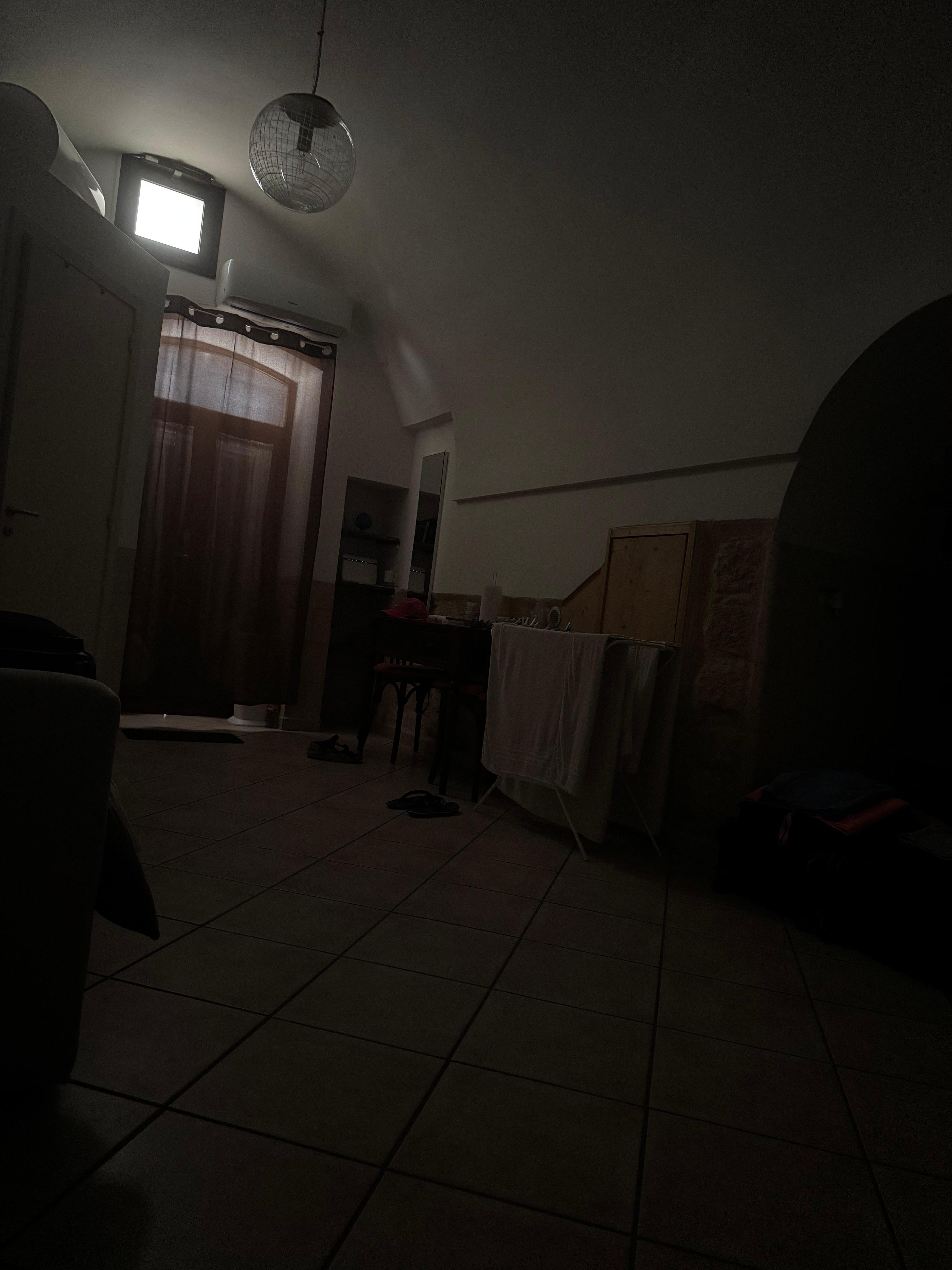 Dark room with no natural light or ventilation.