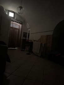 Dark room with no natural light or ventilation.