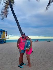 My wife & I few steps away from our room & on the beach !