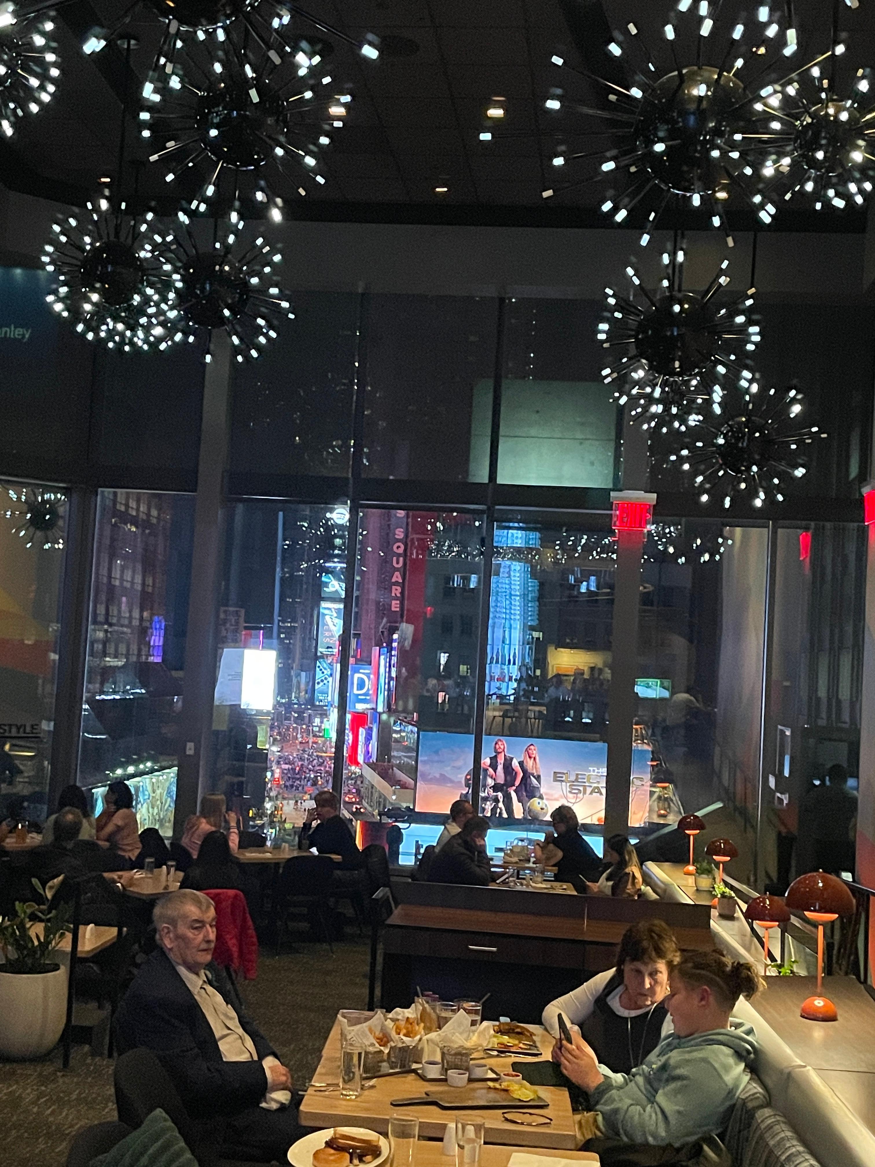Hotel bar overlooking dining area overlooking Times Square