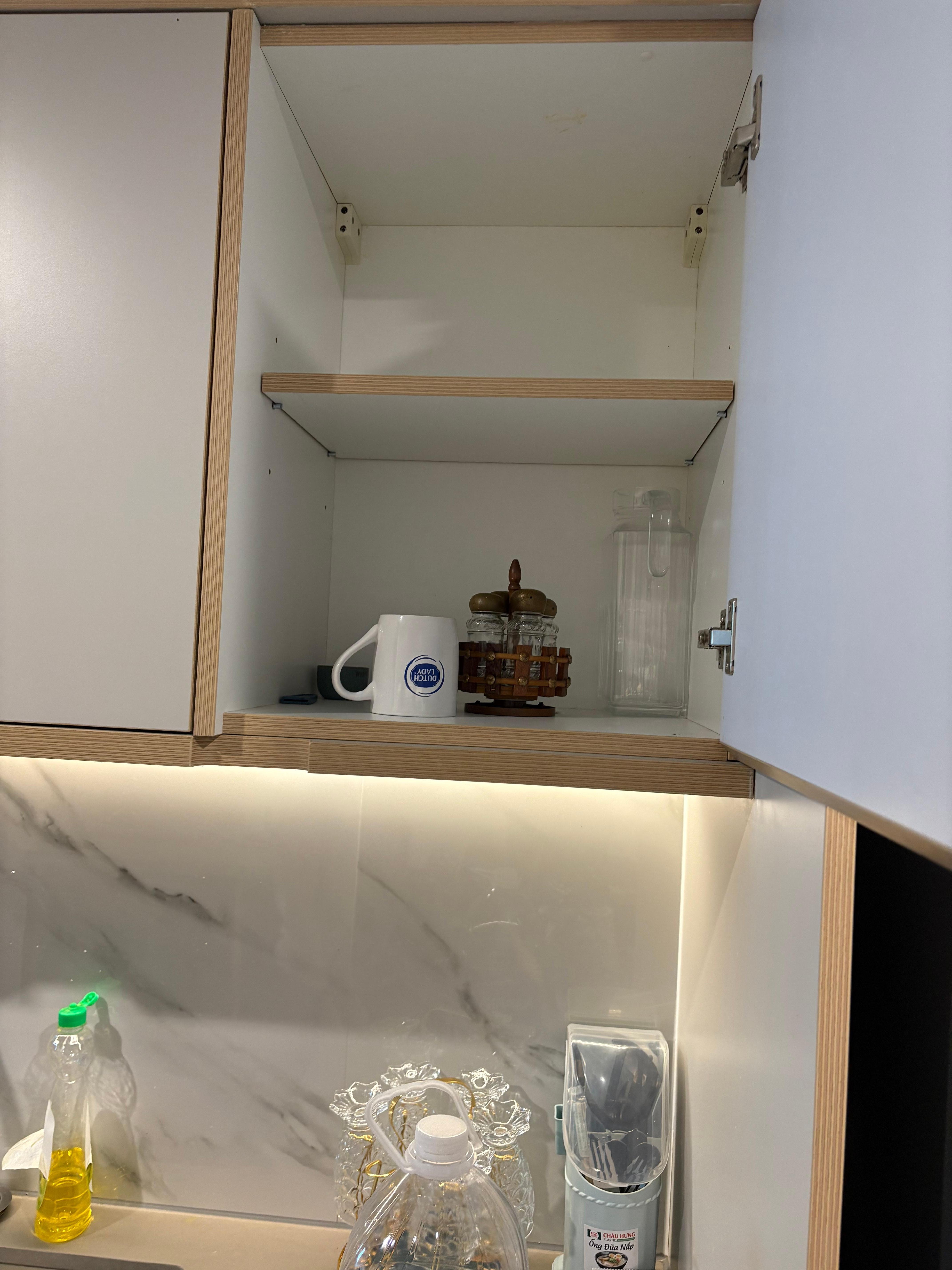 This is the cupboard with drinking cups. 