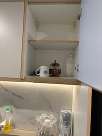 This is the cupboard with drinking cups.