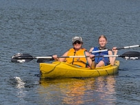 Enjoying the kayaks on David's Pond