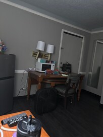 Definitely creepy with the door behind the table