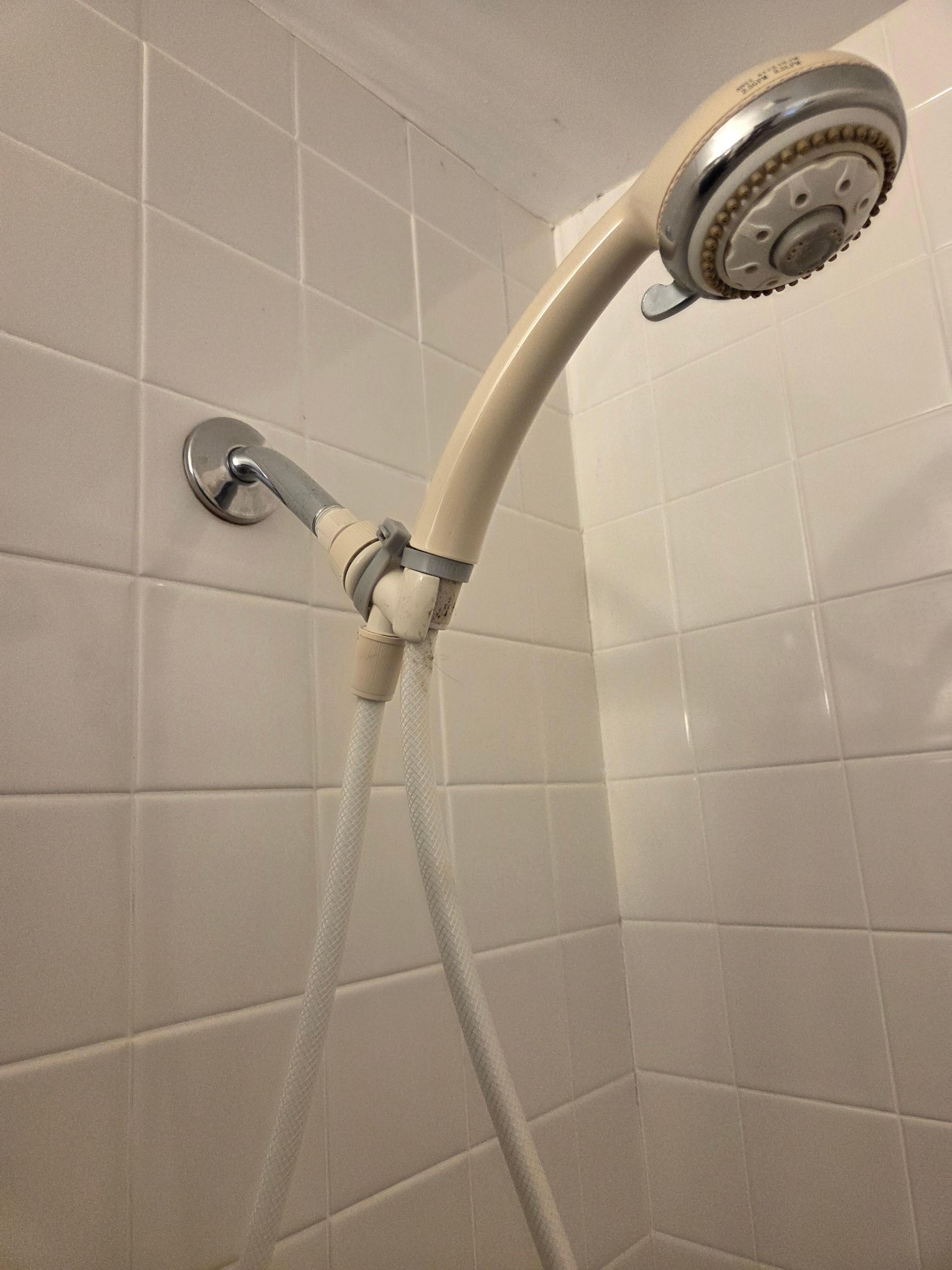 Had to u zip ties to rig shower head.