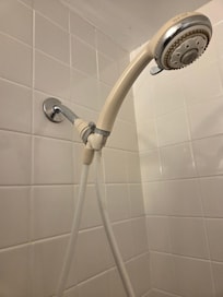 Had to u zip ties to rig shower head.