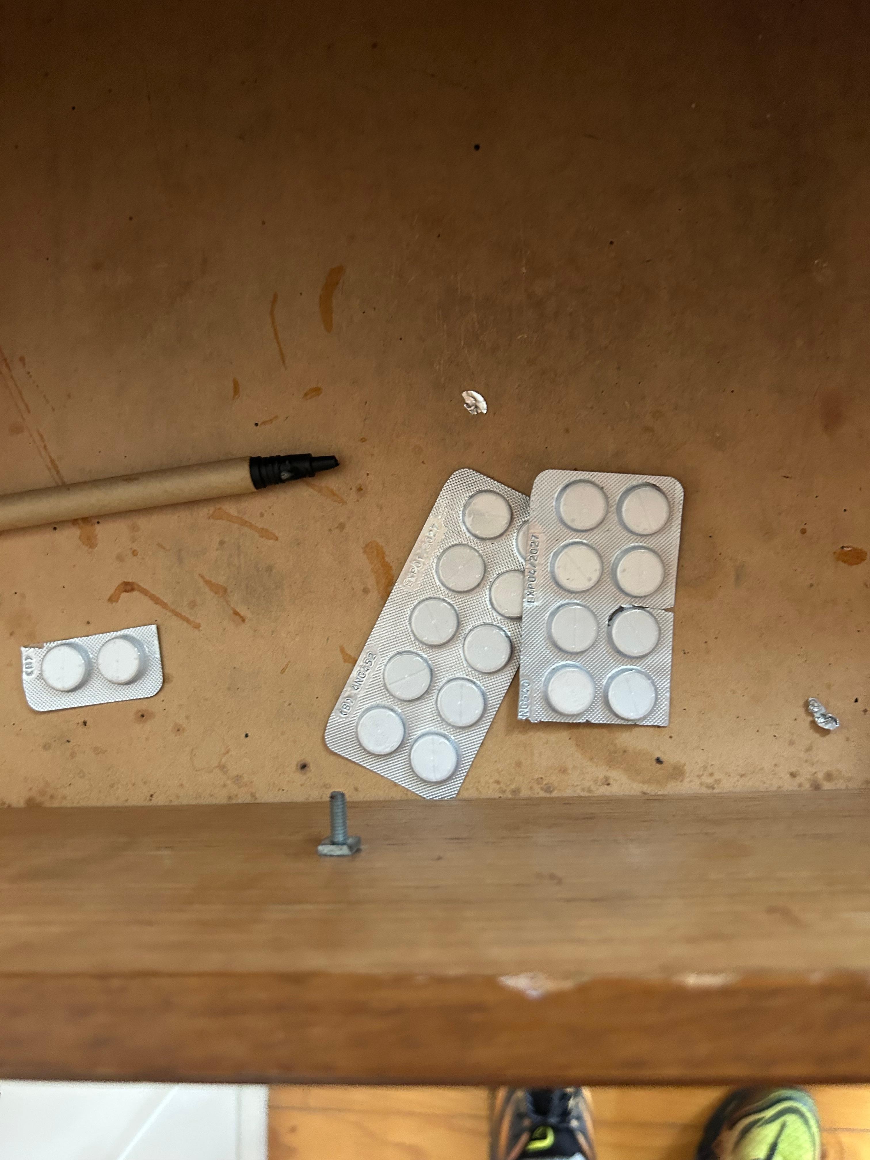 Medicine and personal belongings in a drawer 