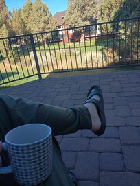Morning coffee on the deck with a view of the creek.