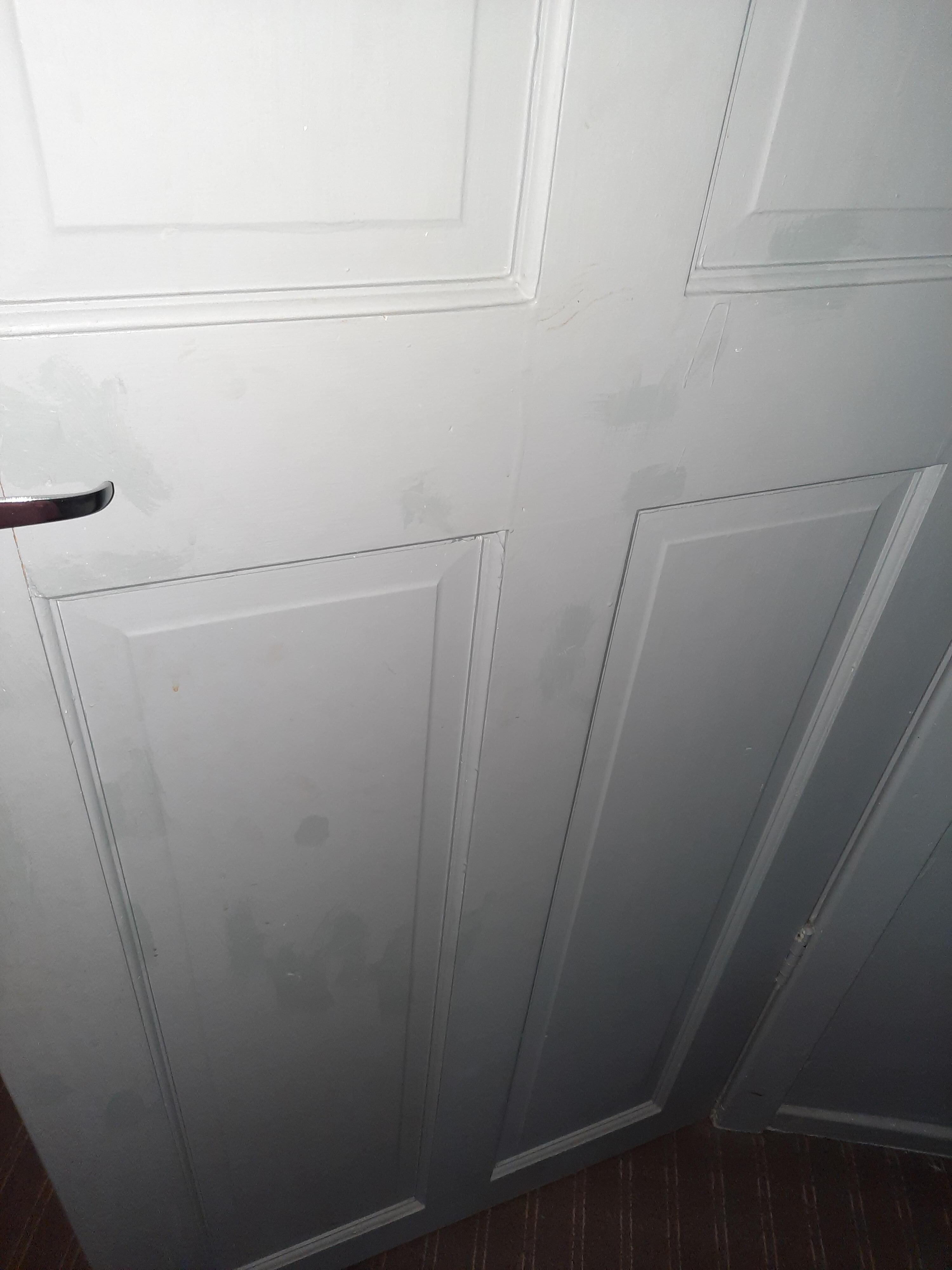 Marks all over the bathroom door