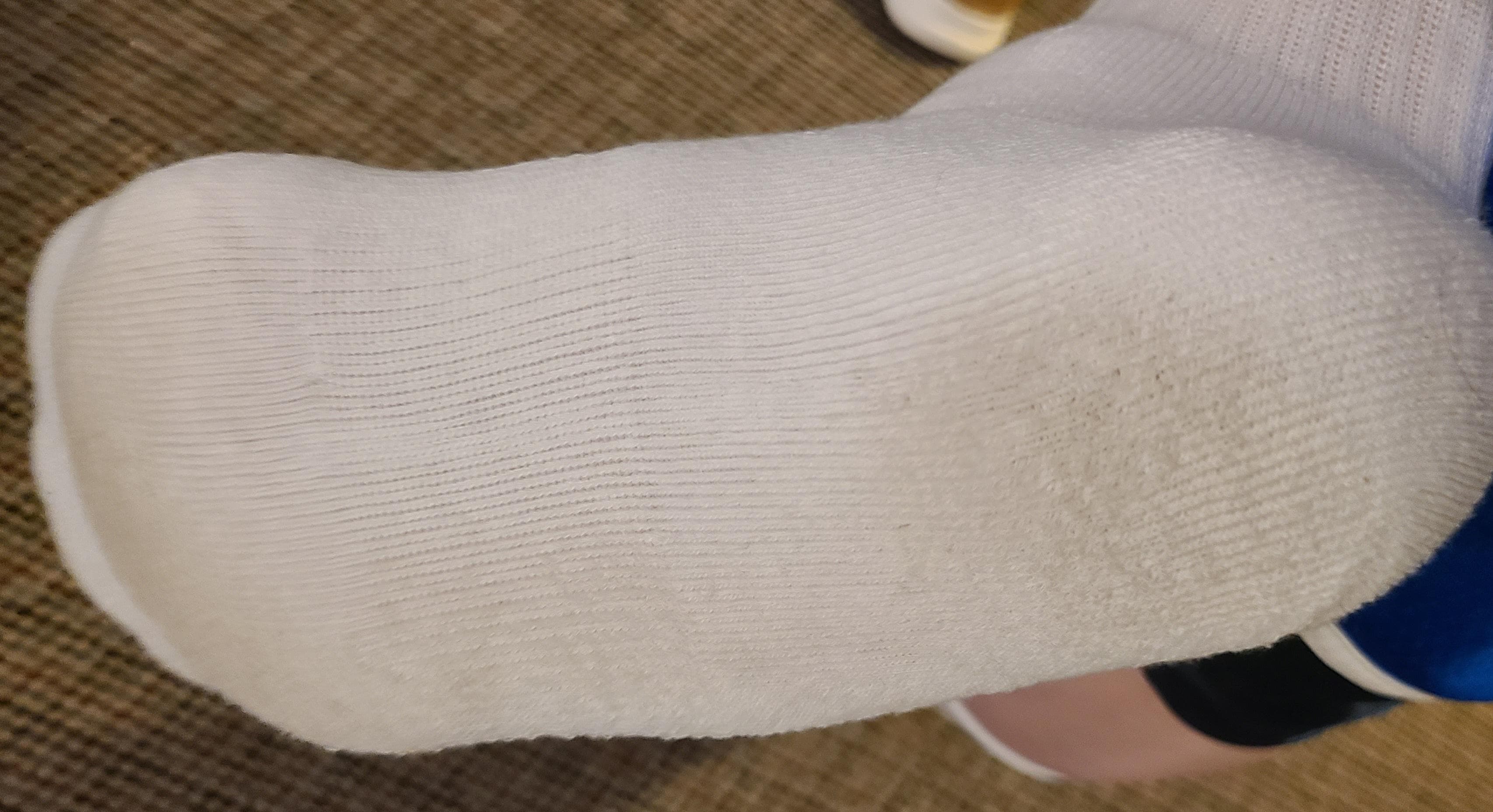 Dirty brand new sock after walking across the room only twice--Disgusting