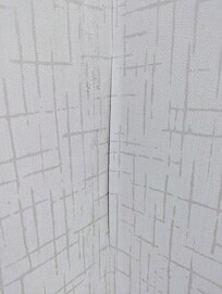 more wallpaper starting to peel off