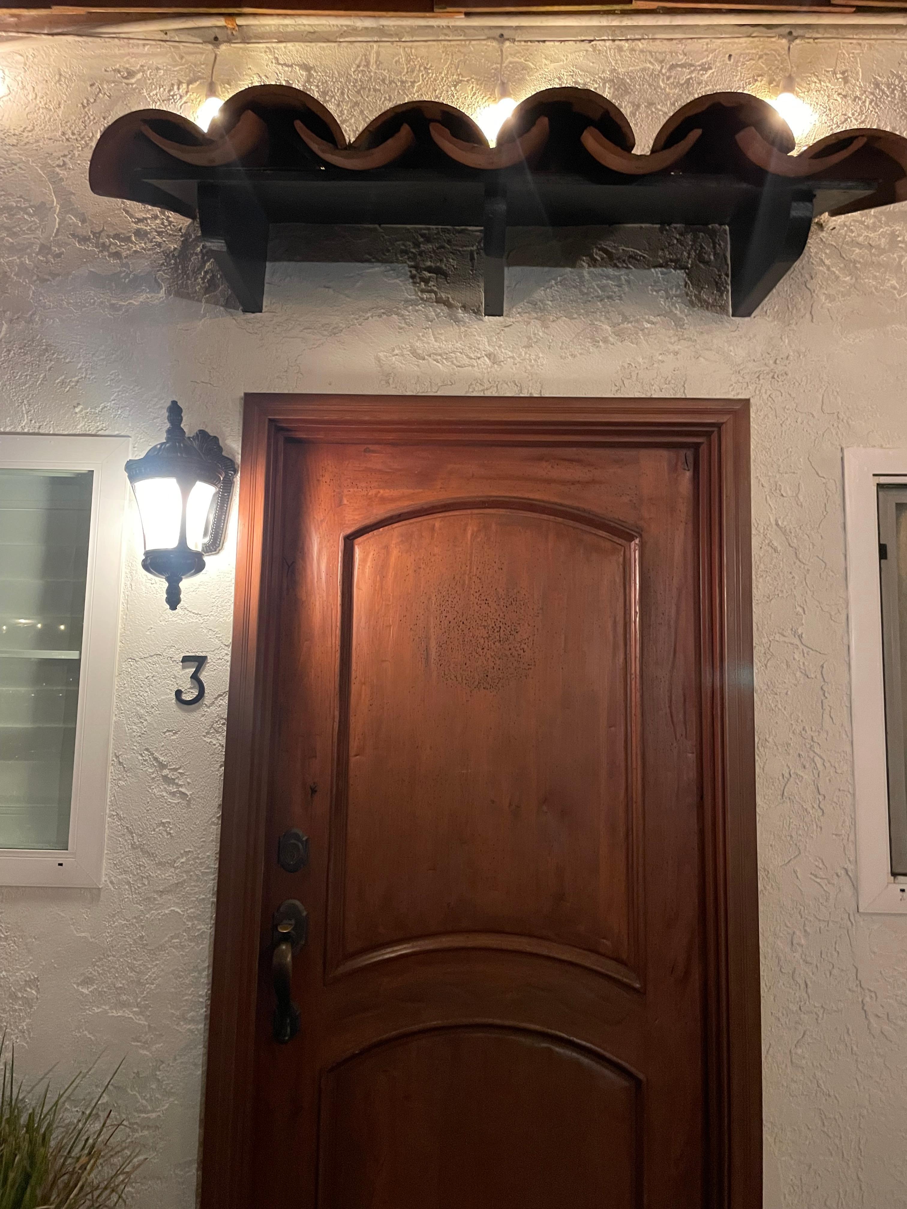 My front door at room 3. Rustic vintage beach motel vibe. 