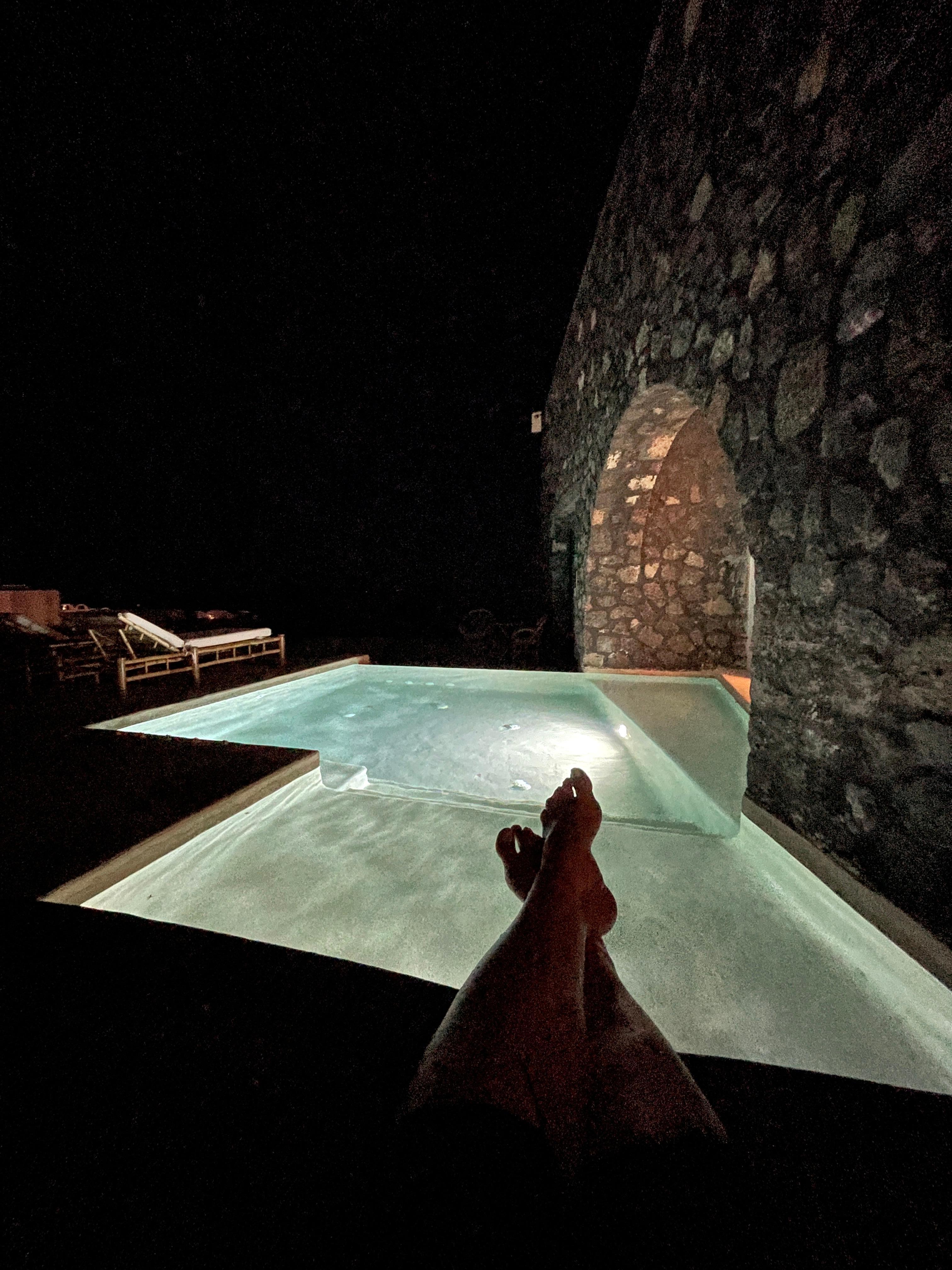 Nighttime view of patio of Cave Junior Suite with Private Pool