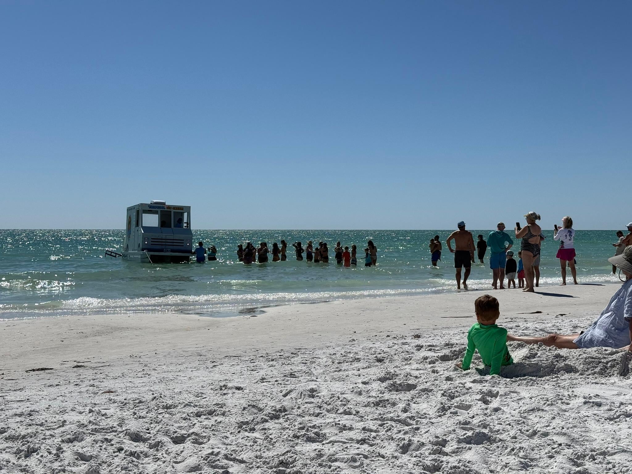 Ice cream pontoon boat service at beach access 7