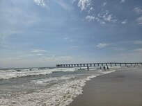 The beach & Ocean behind Margaritaville.