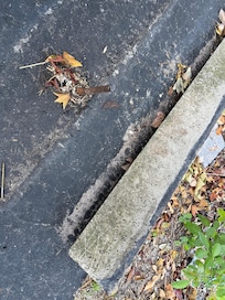 Rebar in parking area can cause tire damage
