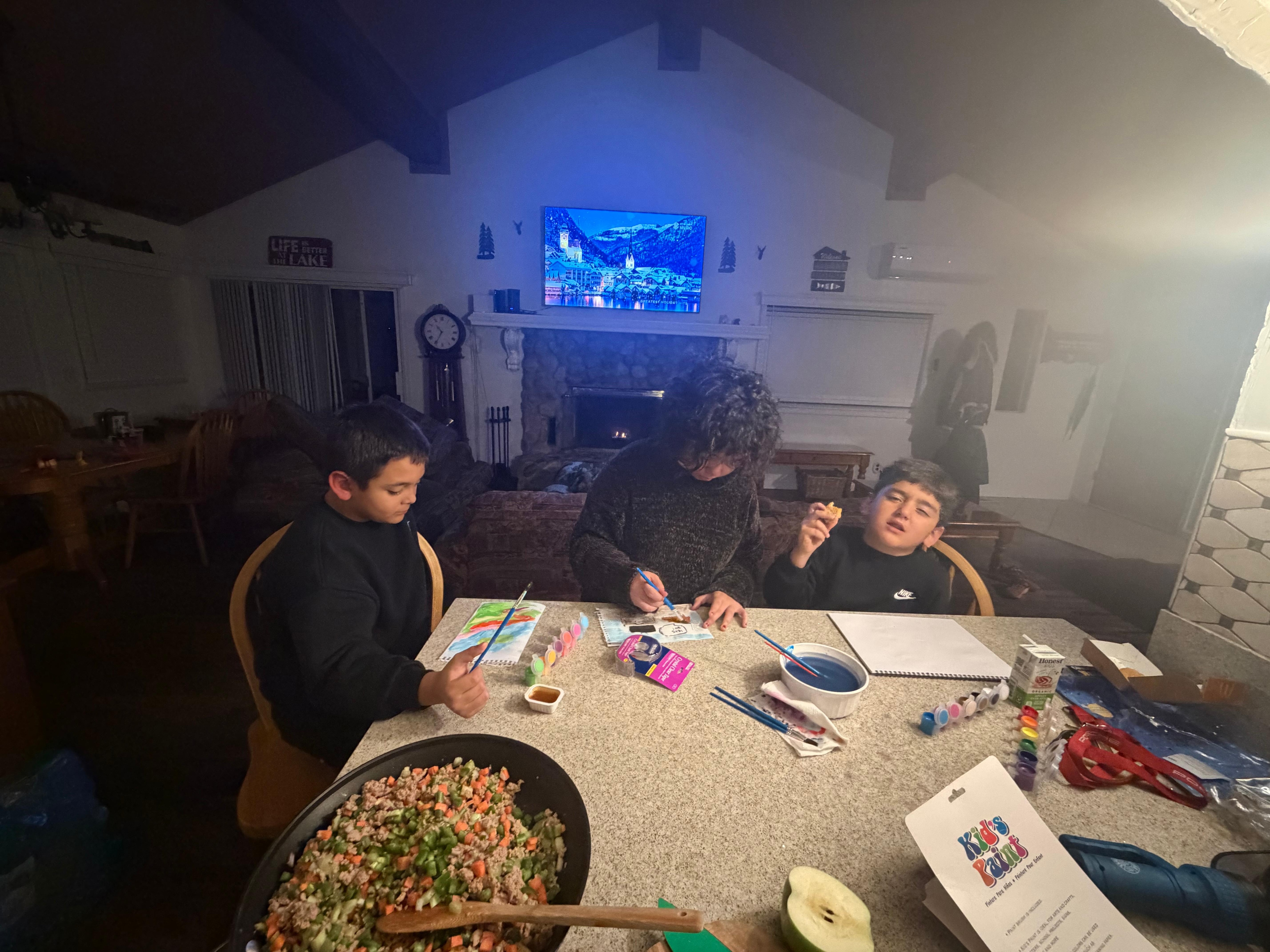 Kids painting while mommy cooks her famous stuffing. 