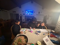 Kids painting while mommy cooks her famous stuffing.