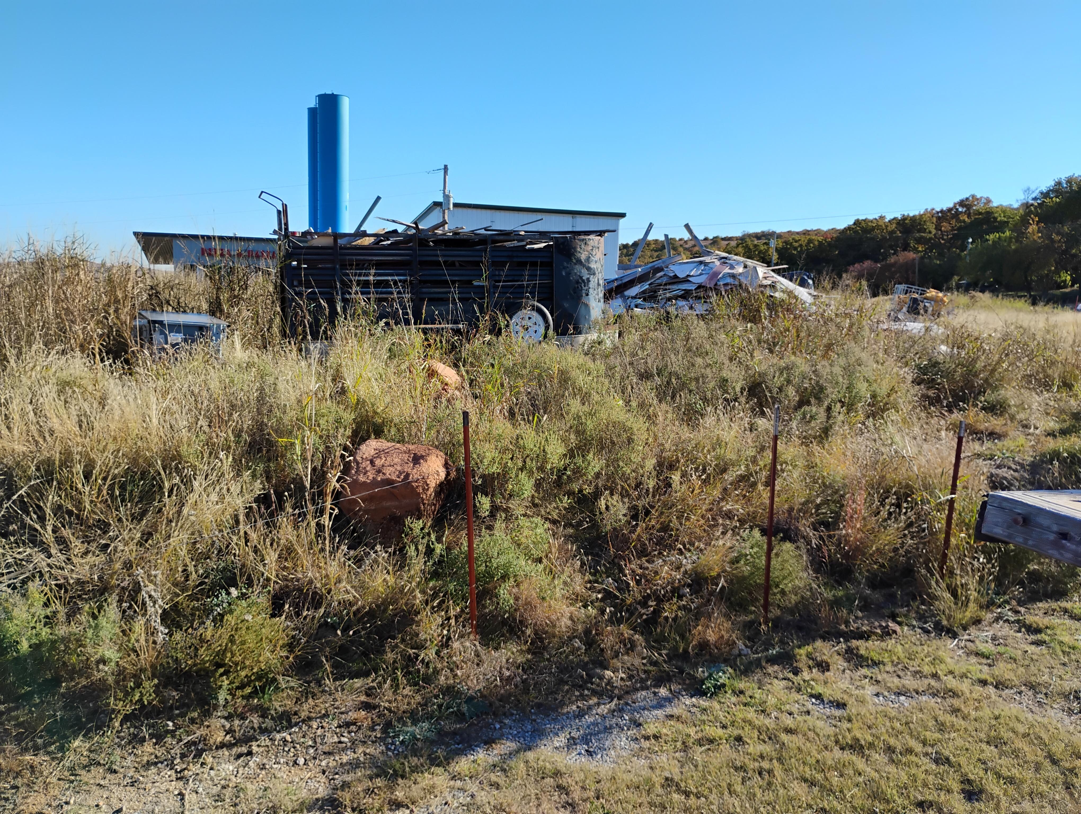 This is an old house site and dump it sets to the north side of the cabin. Great view of a landfill.